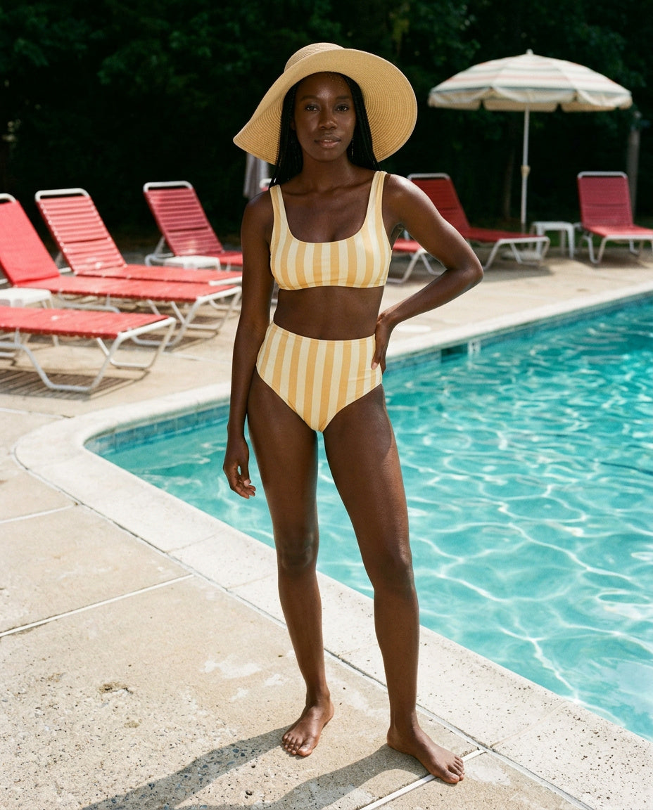 Homepage hero image: woman in yellow and white striped suit